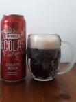Birell Cola - s prichuti koloveho orechu, michany napoj z piva nealkoholicke pivo plechovka a sklenice